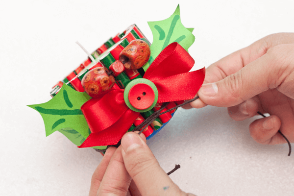 Add beads to festive advent candle